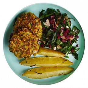 Zucchini fritters with garden salad and potatoes